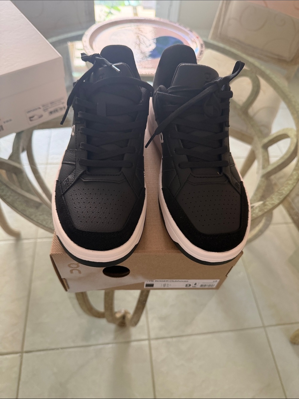On Running Black and White Low-Top Sneakers